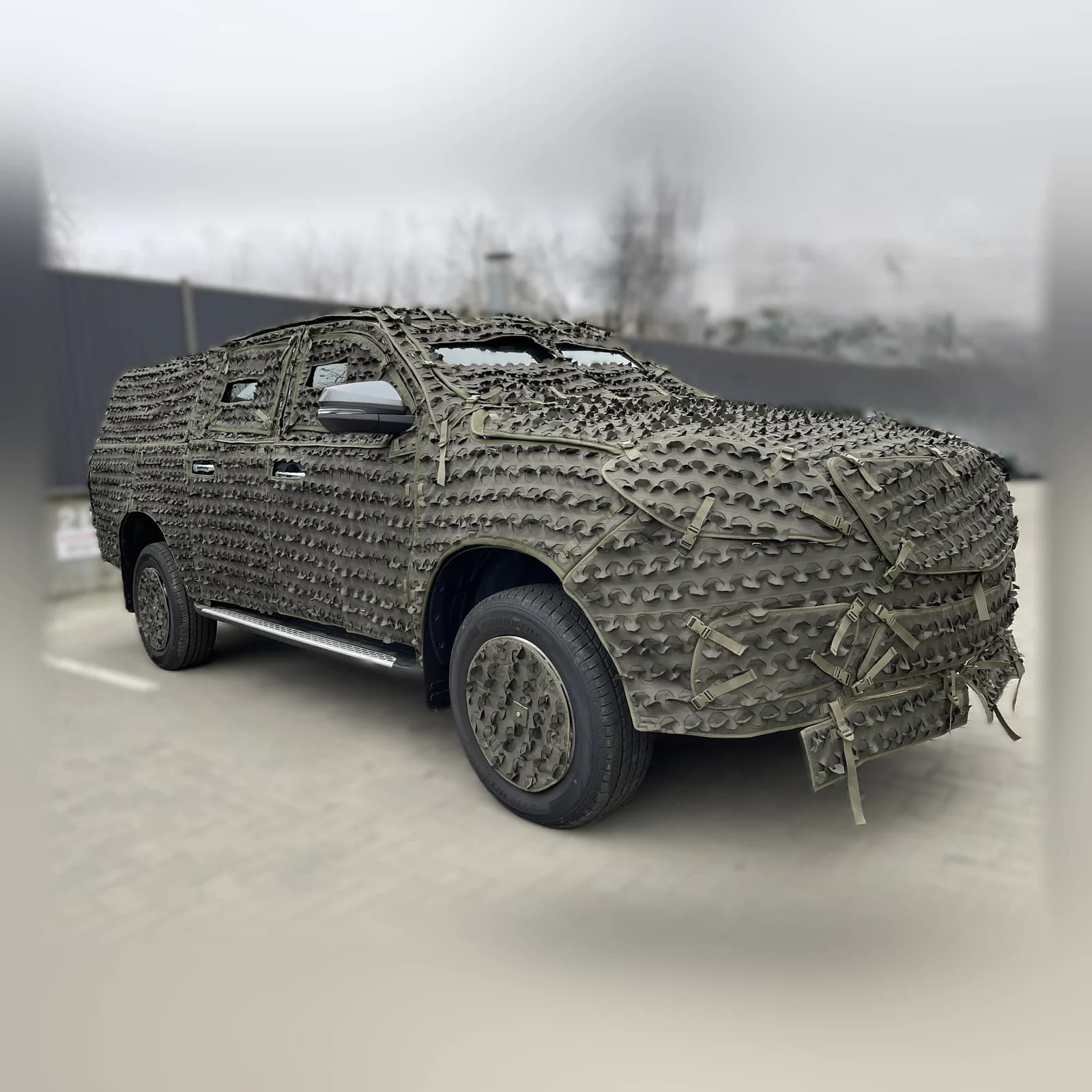 Автомобіль JAC T6 із маскувальним покриттям